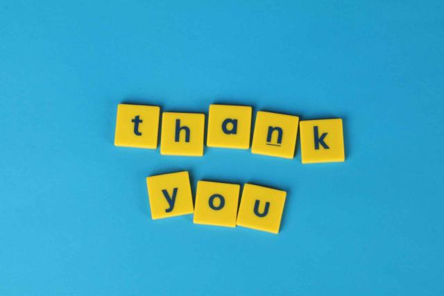 thank you tiles on blue background